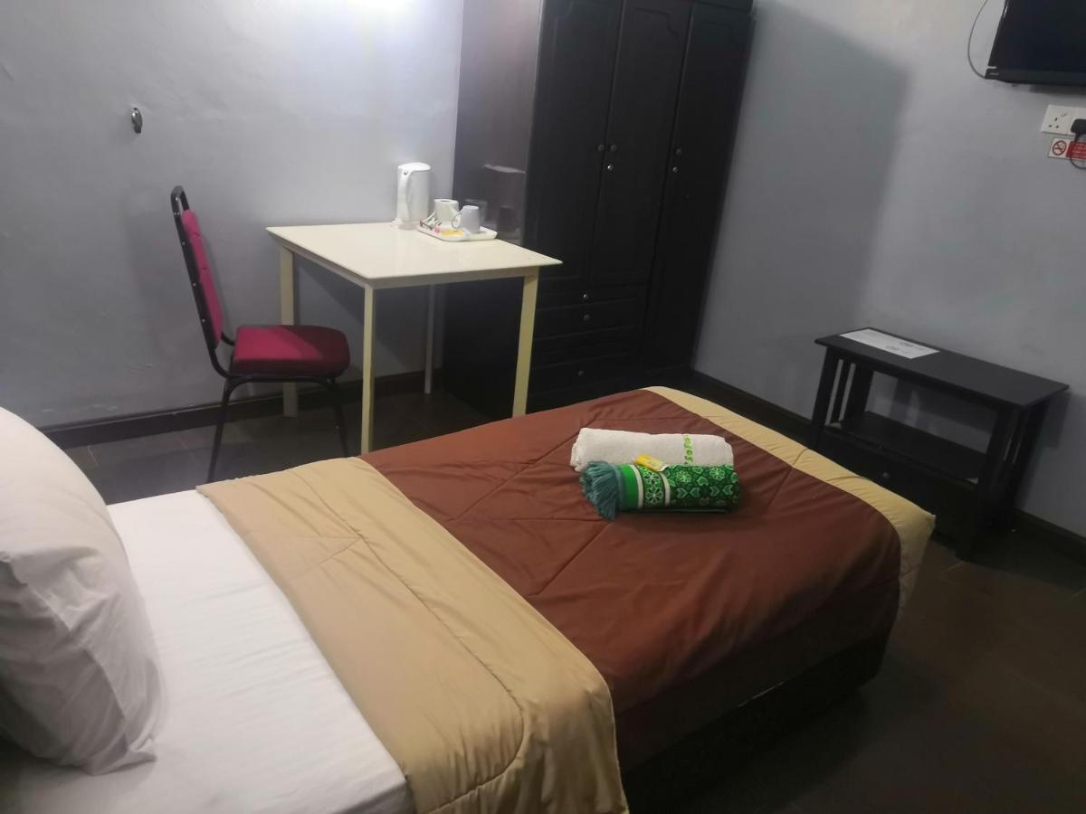Oyo 90473 Opah Inn Hotel Kampong Ayer Terjun Екстериор снимка