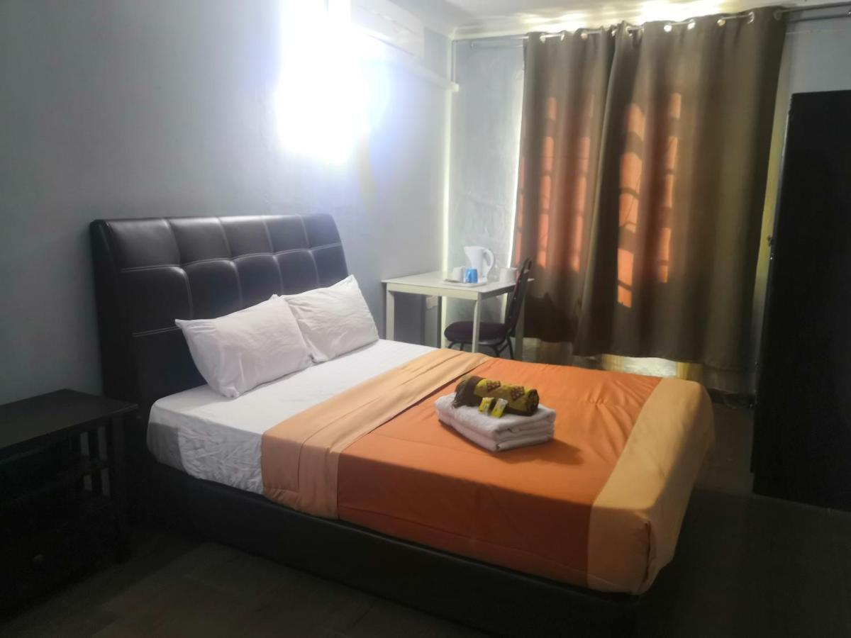 Oyo 90473 Opah Inn Hotel Kampong Ayer Terjun Екстериор снимка
